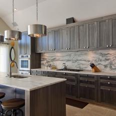 Gray Cabinets & Marble Backsplash in Contemporary Kitchen