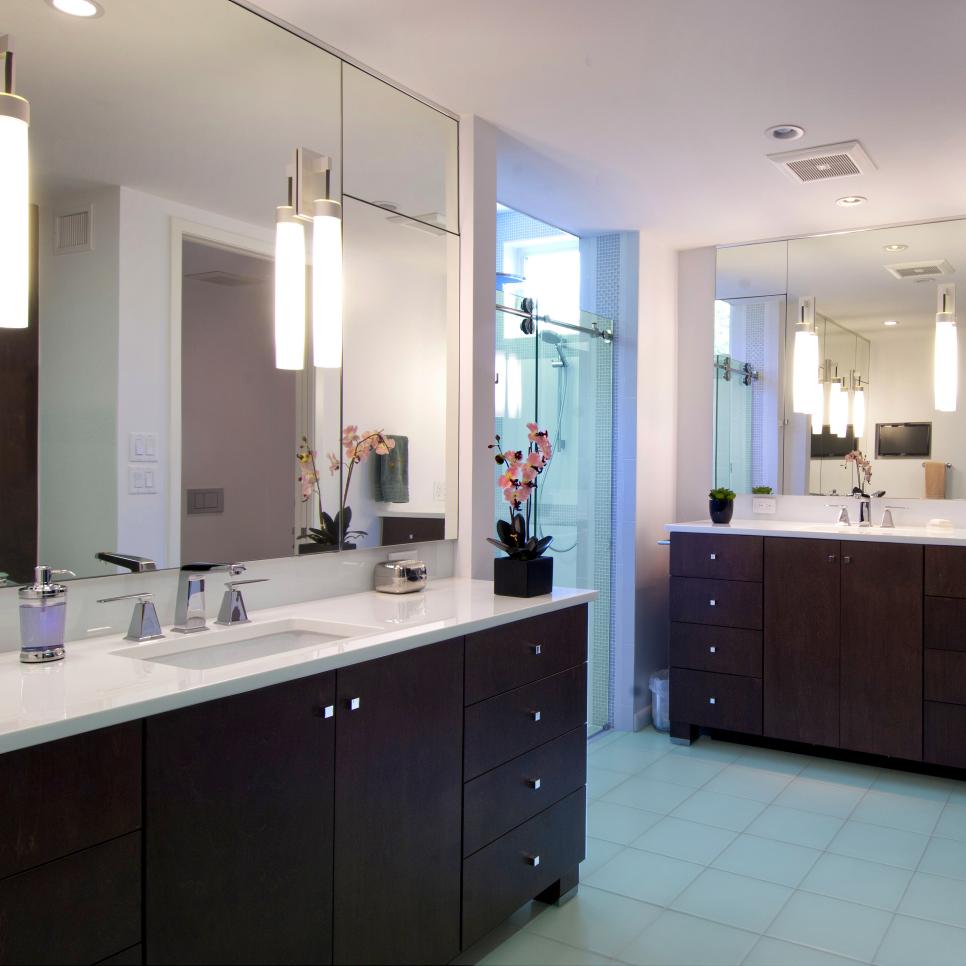 Contemporary Master Bathroom Boasts Brown Wood Vanities | HGTV