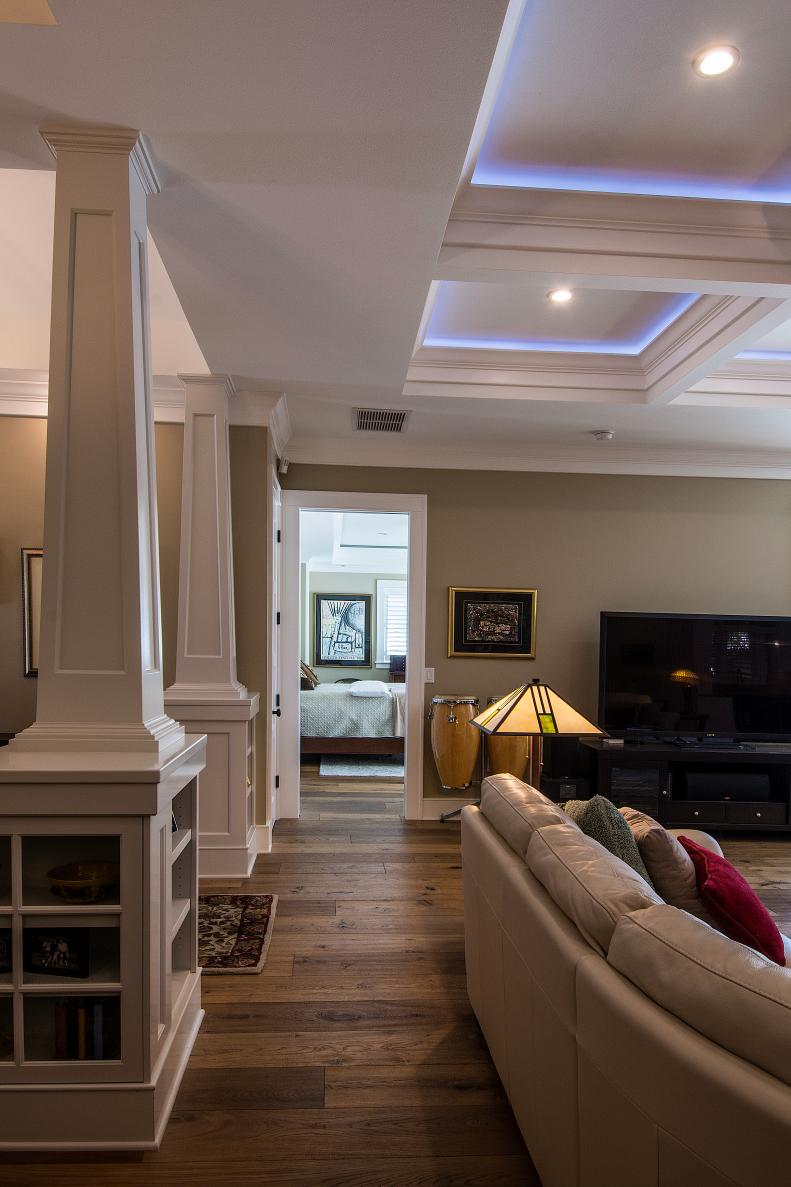 Foyer With White Column Bookcases & Living Area With Coffered Ceiling