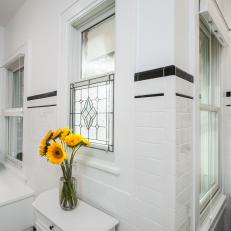 Vintage-Style Accent Window Adds Drama to Simple Bathroom