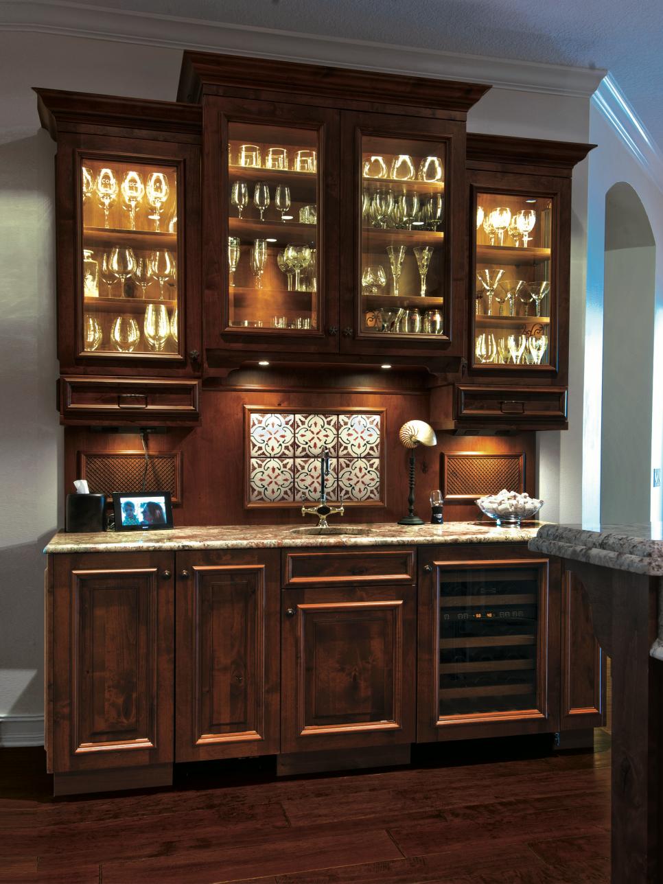 Traditional Wet Bar With Lighted Glass-Front Cabinets | HGTV