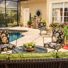Tropical Backyard Patio with Bright Green Topiary