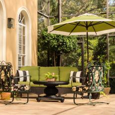 Tropical Backyard Patio with Green Sofa