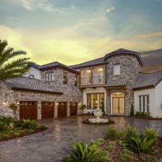 Tuscan-Inspired Home With Four-Car Garage