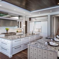 Bright, Transitional Kitchen Boasts Two Islands