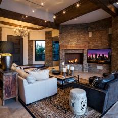 Open, Rustic Living Room With Stunning Stone Fireplace