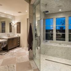 Glamorous Bathroom With Walk-In Shower and Marble Bathtub