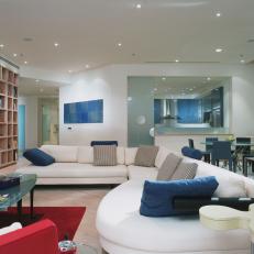 Contemporary Living Area With Chic White Sectional