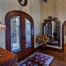Tuscan Foyer With Ornate Front Doors