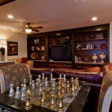Tuscan-Style Living Room Features Elegant Chess Table