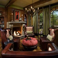 Elaborate Sitting Room With Built-Ins & Cast Stone Fireplace
