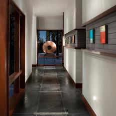 Contemporary Hallway With Gray Tile Floors