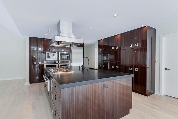 High Gloss Brown Cabinets Wow In Contemporary Kitchen Hgtv
