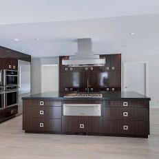 Contemporary Kitchen With Brown Cabinets Is Sleek, Polished