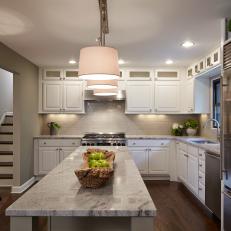 Neutral Transitional Kitchen With Marble Island