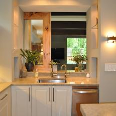 Neutral Kitchen Sink and White Cabinets