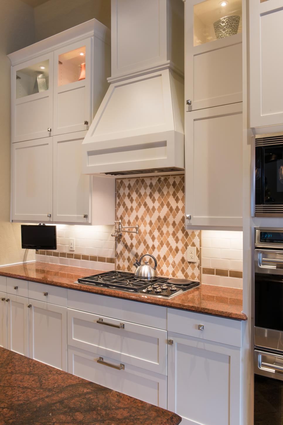 White Shaker Cabinets & Range Hood in Transitional Kitchen ...