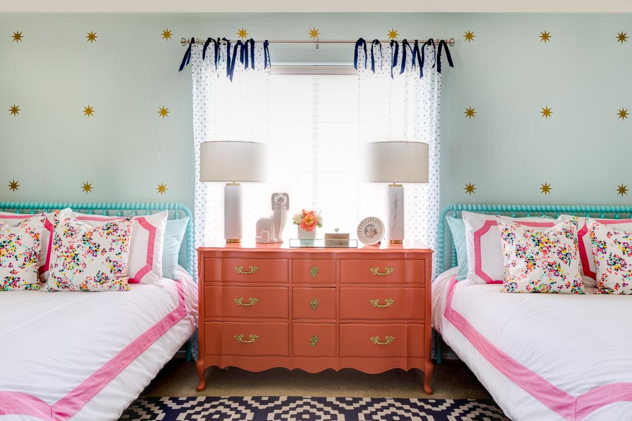 Girl S Bedroom With Coral Dresser And Light Blue Accent Wall