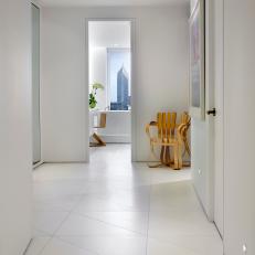 Modern White Hallway With Triangular Tile Floor