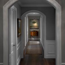 Gorgeous Traditional Hallway With White Archways