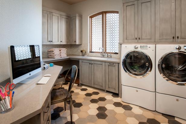 Rustic Laundry Room With Gray Cabinets and Desk