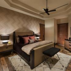 Rustic Guest Room With Chevron Accent Wall