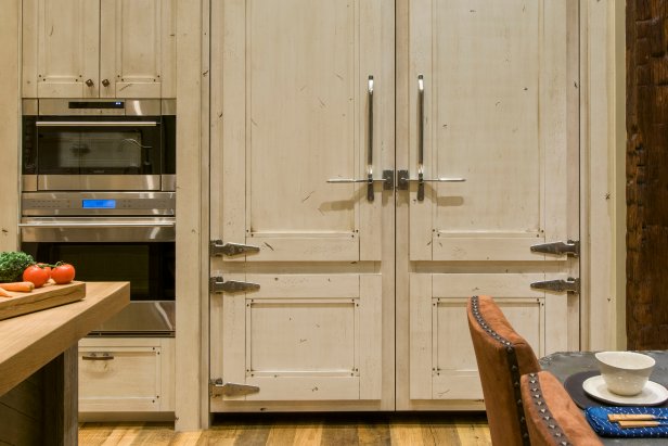Rustic Whitewashed Kitchen Cabinets With Metal Handles & Hinges
