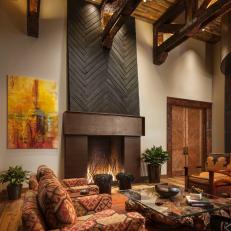 Rust Living Room Boasts Two-Story Fireplace
