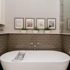 White Freestanding Tub and Gray Tile Backsplash
