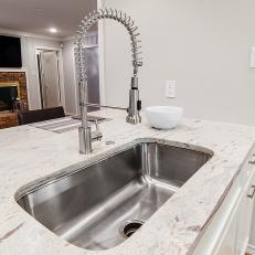 Stainless Steel Kitchen Prep Sink and White Countertops