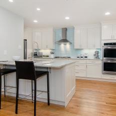 White Transitional Kitchen With Black Barstools