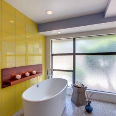 Yellow and White Asian Bathroom With Freestanding Tub