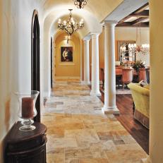 Traditional Hallway with Iron Chandeliers