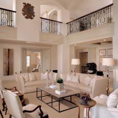 Transitional Living Room Boasts Two-Story Ceilings