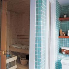Cheerful Aqua Bathroom Boasts Sauna