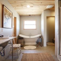 Eclectic Master Bathroom Boasts Freestanding Tub