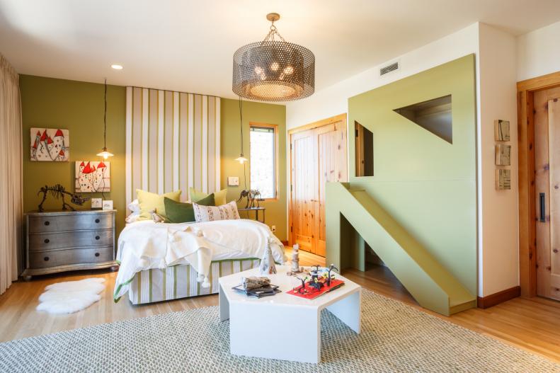 Kid's Green Room With Green Play Structure and White Bedding