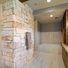 Stone Wall Wows in Contemporary Master Bathroom