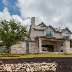 Transitional Stone and Stucco Home With Tiered Backyard