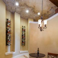 Curved Stone Steps Lead Into Hidden Wine Room