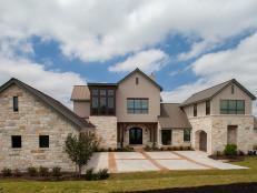 Transitional Home Features Stone and Stucco Exterior