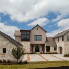 Transitional Home Features Stone and Stucco Exterior