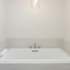 Clean-Lined Bathtub in Minimalist Bathroom