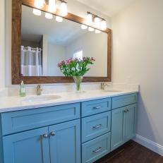 Blue Vanity Takes a Cue From the Sea in Coastal Bathroom