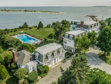 Aerial View of Waterfront Estate With Victorian Houses & Swimming Pool