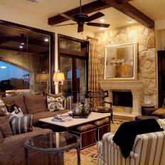 Transitional Living Room Features Stone Accent Wall