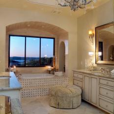 Luxurious Master Bathroom With Decorative Bathtub Surround & View