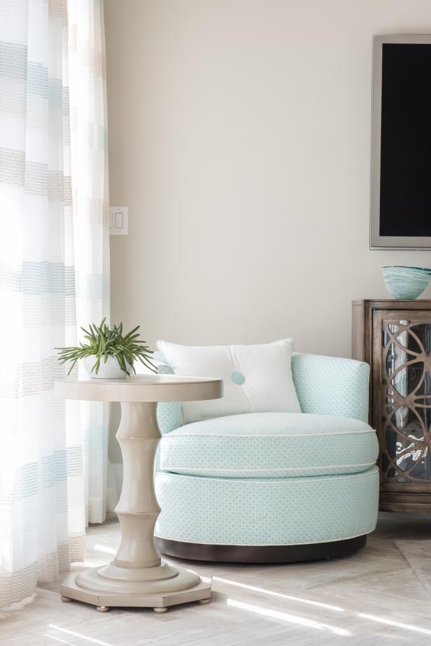 Neutral Contemporary Sitting Room With Light Blue Armchair