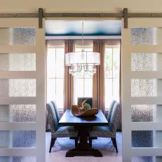 Frosted Glass Sliding Doors Reveal Chic Dining Room