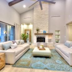 Beautiful, Contemporary Living Room Features High Ceilings & Calm Color Accents